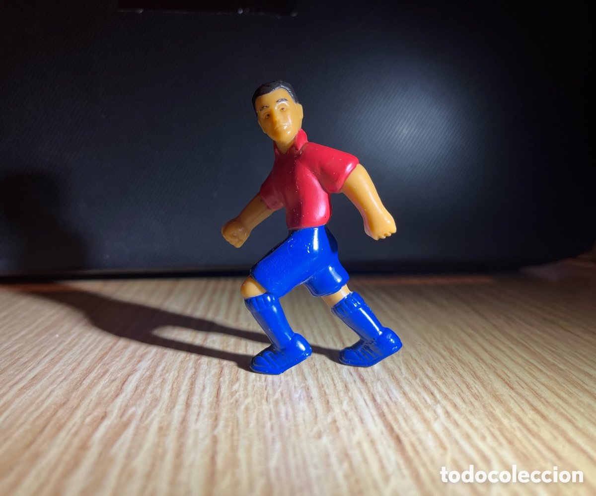 Figuras de acci&oacute;n: Mu&ntilde;eco jugador de F&uacute;tbol de pl&aacute;stico. Uefa Euro 2000. 1999 NPI Liverpool L1 68Q. UK. Cereales Nestl&eacute;