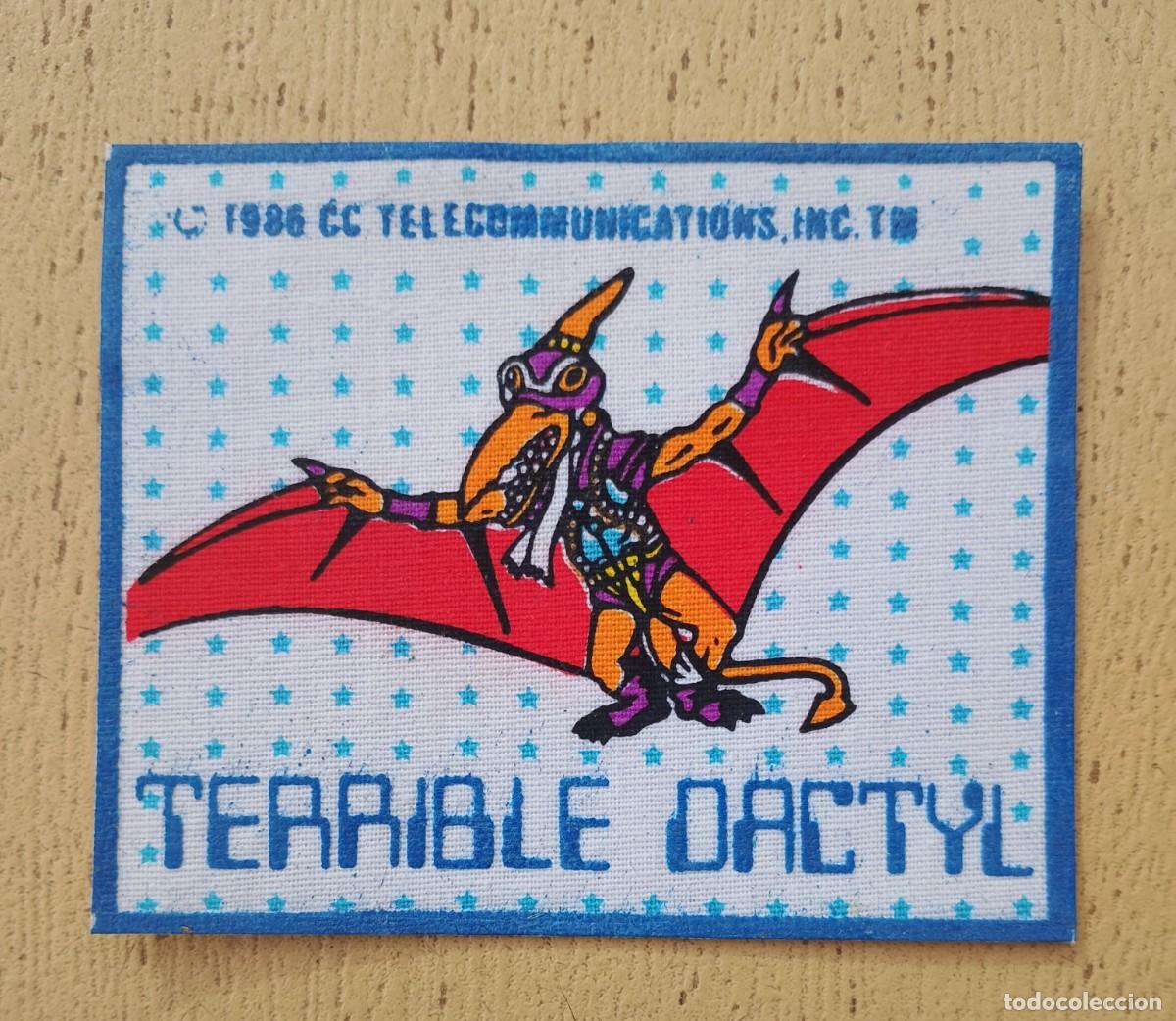 Figuras de acci&oacute;n: Parche Termoadhesivo Terrible Dactyl Dinosaucers Dinoplativolos D&aacute;ctilo Terrible