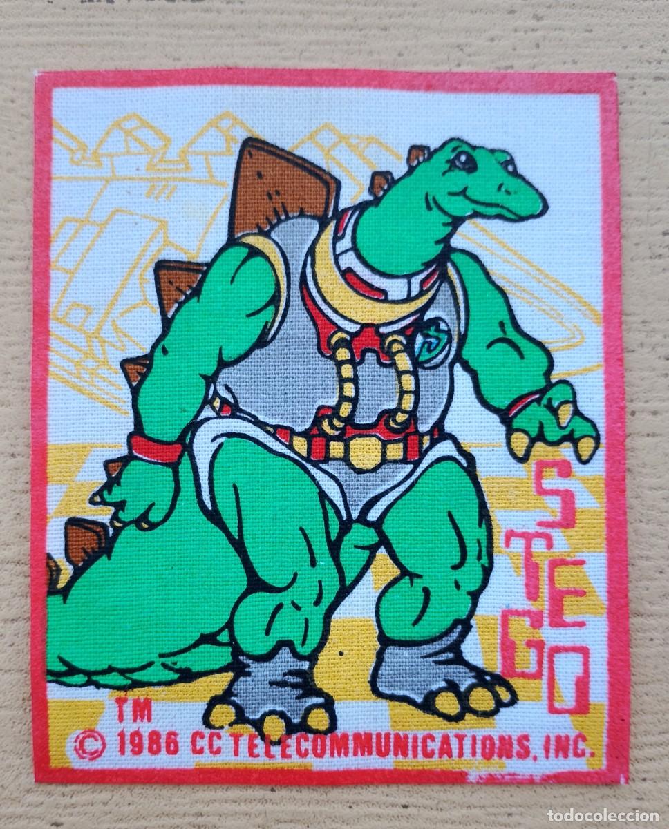 Action Figures: Parche Termoadhesivo Stego Dinosaucers Dinoplativolos