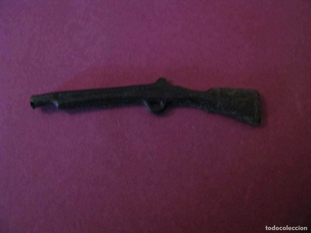 Figuras de acci&oacute;n: PIEZA, ARMA DE ALGUN PERSONAJE DE ACCION.