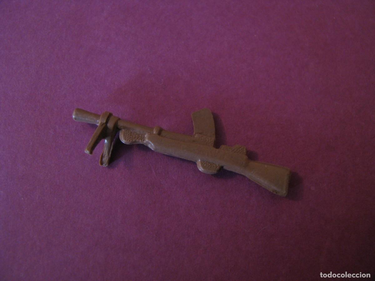 Figuras de acci&oacute;n: PIEZA, ARMA DE ALGUN PERSONAJE DE ACCION.
