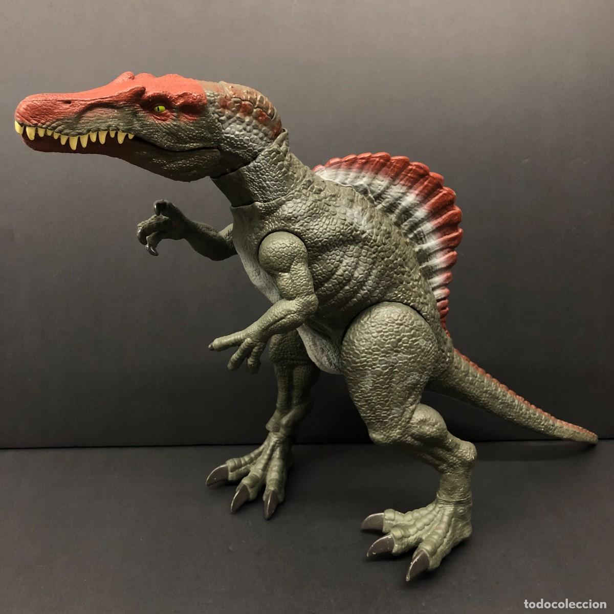 Figuras de acci&oacute;n: DINOSAURIO - FIGURA DE ACCION - SPINOSAURUS &rdquo;EXTREME CHOMPIN&rdquo; - JURASSIC WORLD - 31 X 54 CM / 27