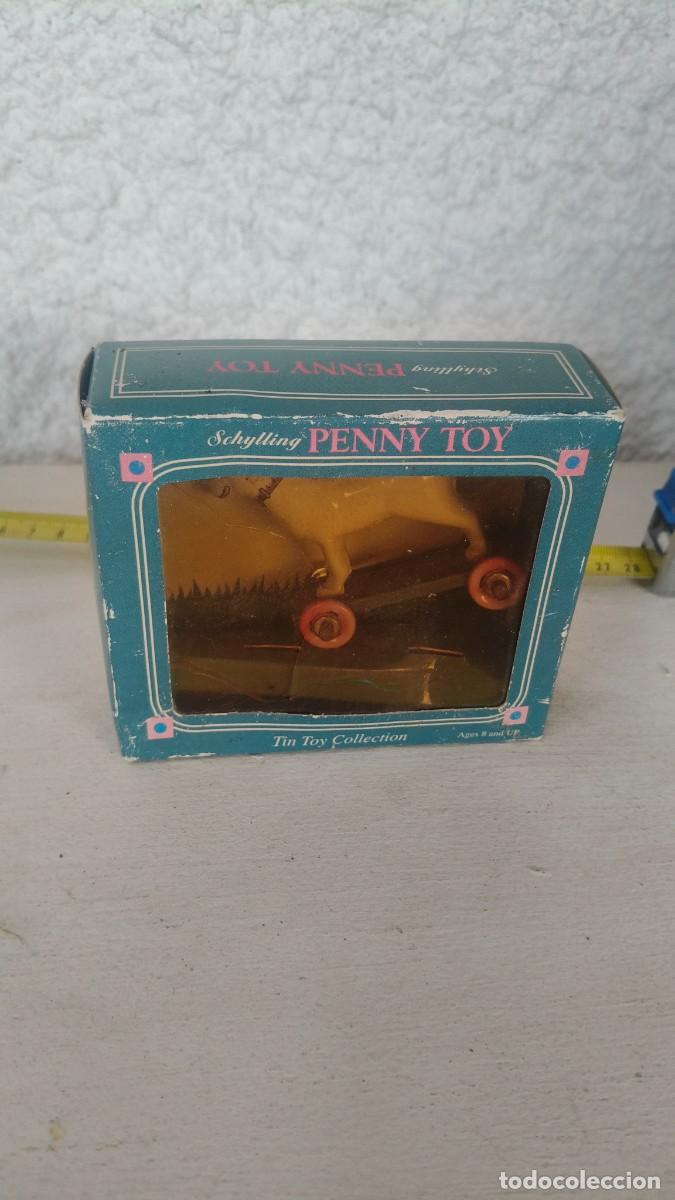 Figuras de acci&oacute;n: Penny toy Schilling chien a roulettes