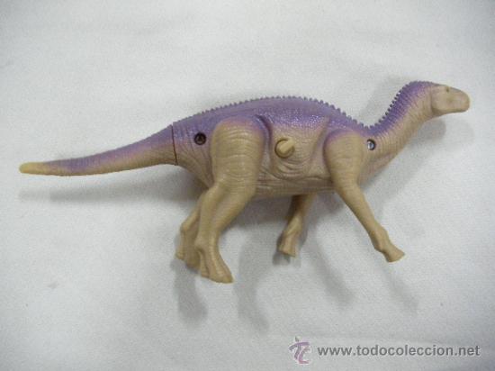 Figuras de goma y PVC: DINOSAURIO A CUERDA - Foto 1