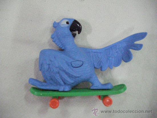 Figuras de goma y PVC: LORO CON PATIN - Foto 1