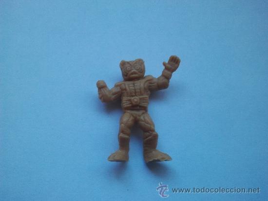 Figuras de goma y PVC: figura  dunkin premium masters del universo - Foto 1