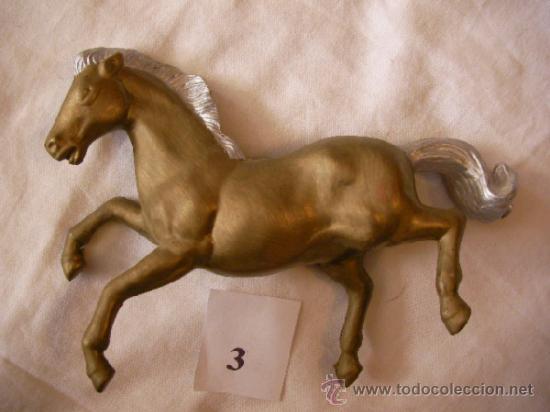 Figuras de goma y PVC: CABALLO DORADO MACIZO - Foto 1