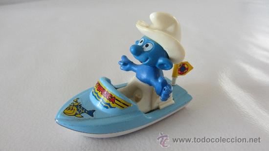 Figuras de goma y PVC: PITUFO SOBRE BARCA - Foto 1