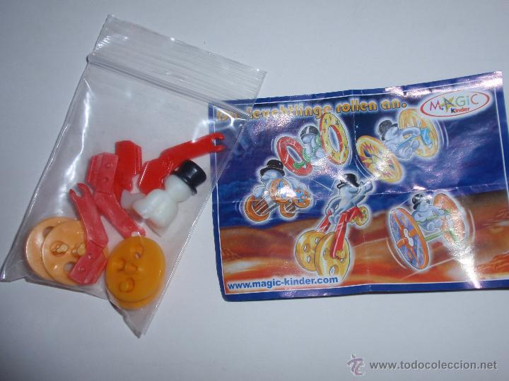 Kinder Figures: FIGURITA HUEVO KINDER FERRERO PERSONAJE CON LUZ SOBRE RUEDAS