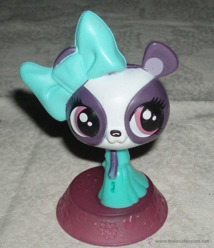 Figuras de goma y PVC: mu&ntilde;eca tipo tentetieso ya que la cabeza es movible