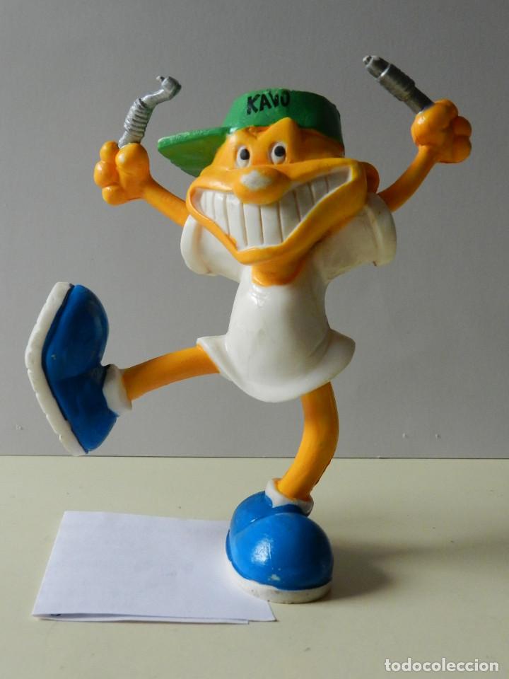 Figuras de goma y PVC: Figura pvc marca dental kavo Dentaltix Dental Excellence premium odontologia mu&ntilde;eco promocional
