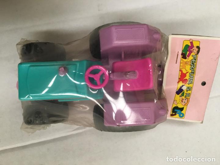 Figuras de goma y PVC: TRACTOR DE PVC A&Ntilde;OS 70 - Foto 2