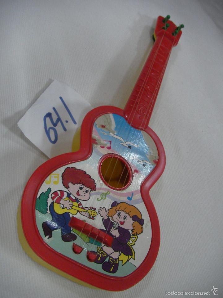 Figuras de goma y PVC: GUITARRA - Foto 1