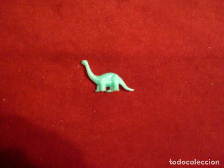 Figuras de goma y PVC: DUNKIN PHOSKITOS DANONE DINOSAURIO - Foto 1