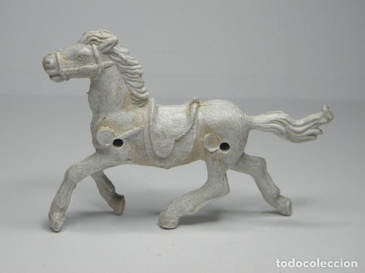 Figuras de goma y PVC: CABALLO DE CARRETAS 5 CM. - Foto 1
