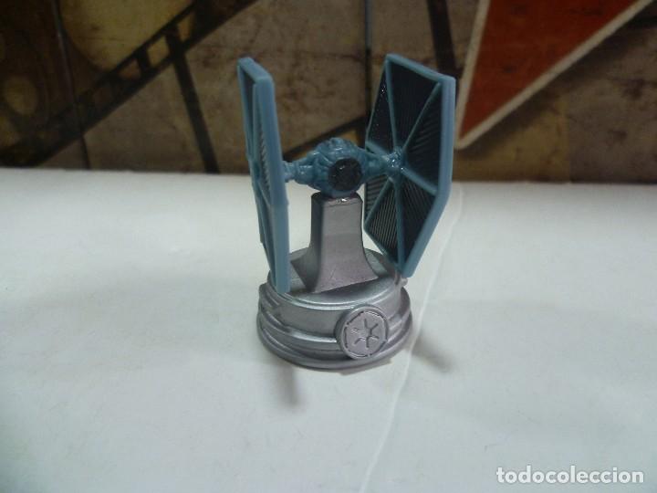 Figure di Gomma e PVC: Caza tie