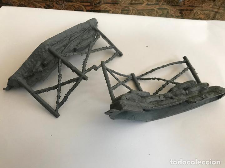 Figuras de goma y PVC: Alambradas PECH - Foto 3