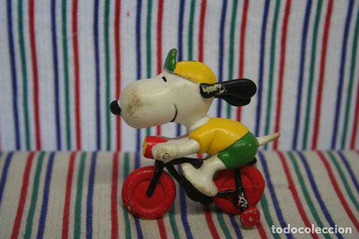 Gummi- und PVC-Figuren: SNOOPY EN BICICLETA DE UNITED FEATURE