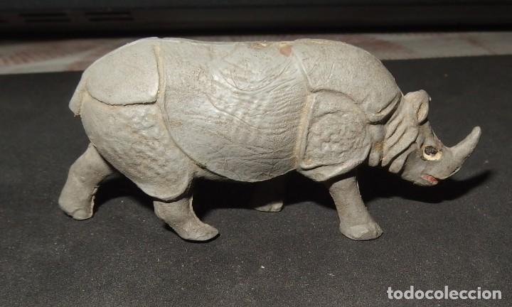 Figuras de goma y PVC: RINOCERONTE,OBSEQUIO DETERGENTE OMO - Foto 1