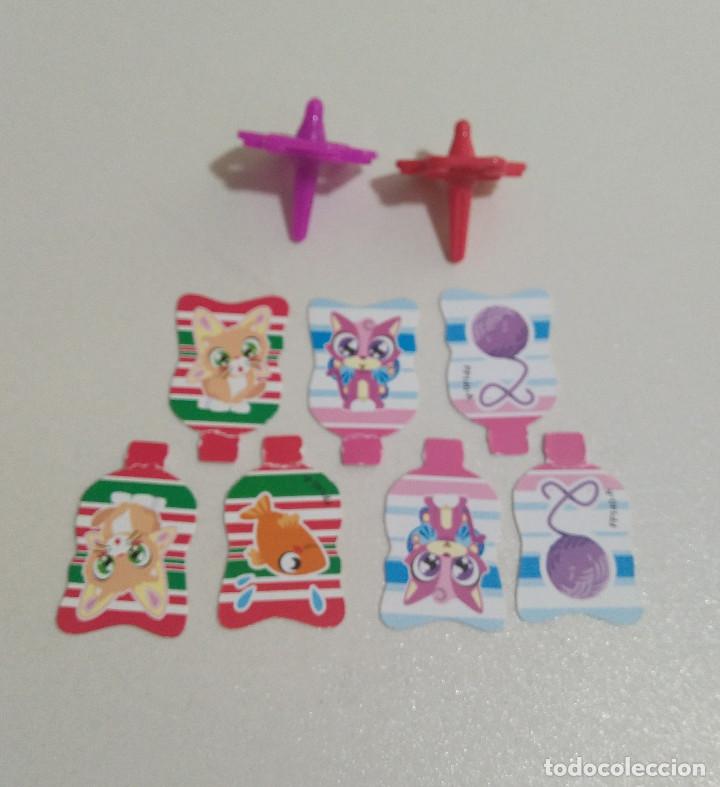 Kinder Figures: kinder peonza repiona ni&ntilde;a gato