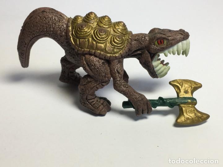 Figuras de goma y PVC: FIGURA DINOSAURIO CON ARMA - Foto 2