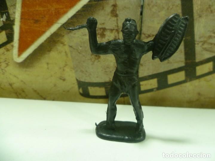 Figure di Gomma e PVC: Figurita guerrero africano
