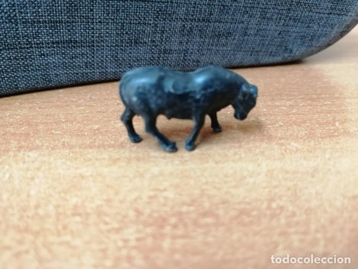 Figuras de goma y PVC: MU&Ntilde;ECO DUNKIN ( TORO NEGRO ) - Foto 1