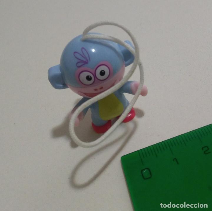 Kinder &Uuml;berraschung: KINDER TWIST HEAD DORA EXPLORADORA EXPLORER COLGANTE MU&Ntilde;ECA MINIATURA FIGURA