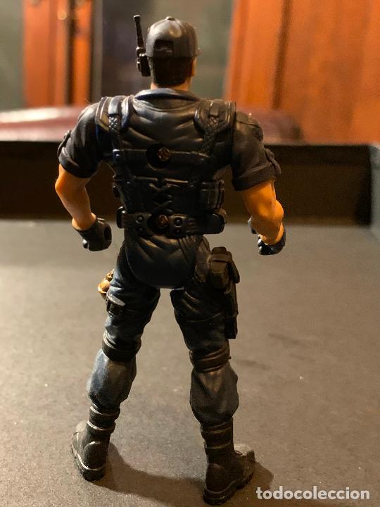 Figuras de goma y PVC: POLICIA Figura de plastico. - Foto 2