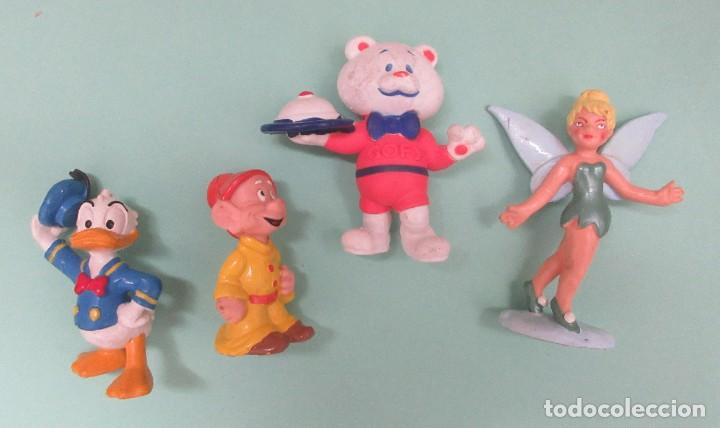 Figuras de goma y PVC: Cuatro mu&ntilde;ecos de PVC