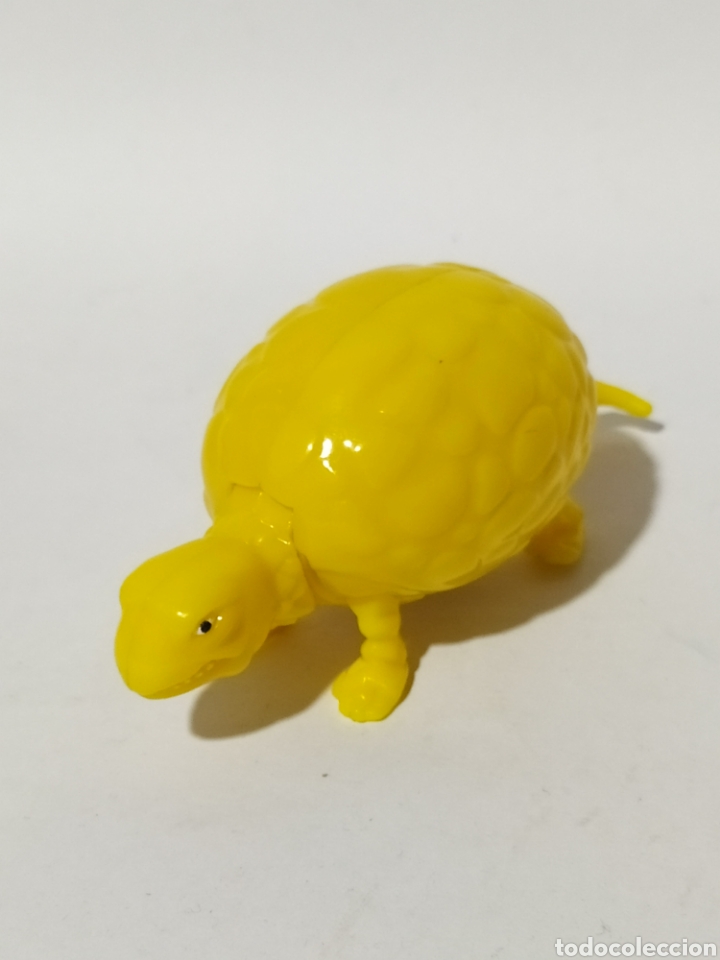 Figuras de Borracha e PVC: Figuras PVC. Huevox. Phoskitos. Dinosaurio amarillo.
