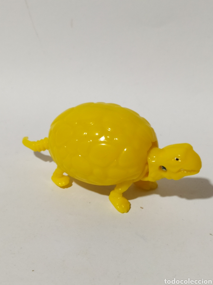 Figuras de Borracha e PVC: Figuras PVC. Huevox. Phoskitos. Dinosaurio amarillo.