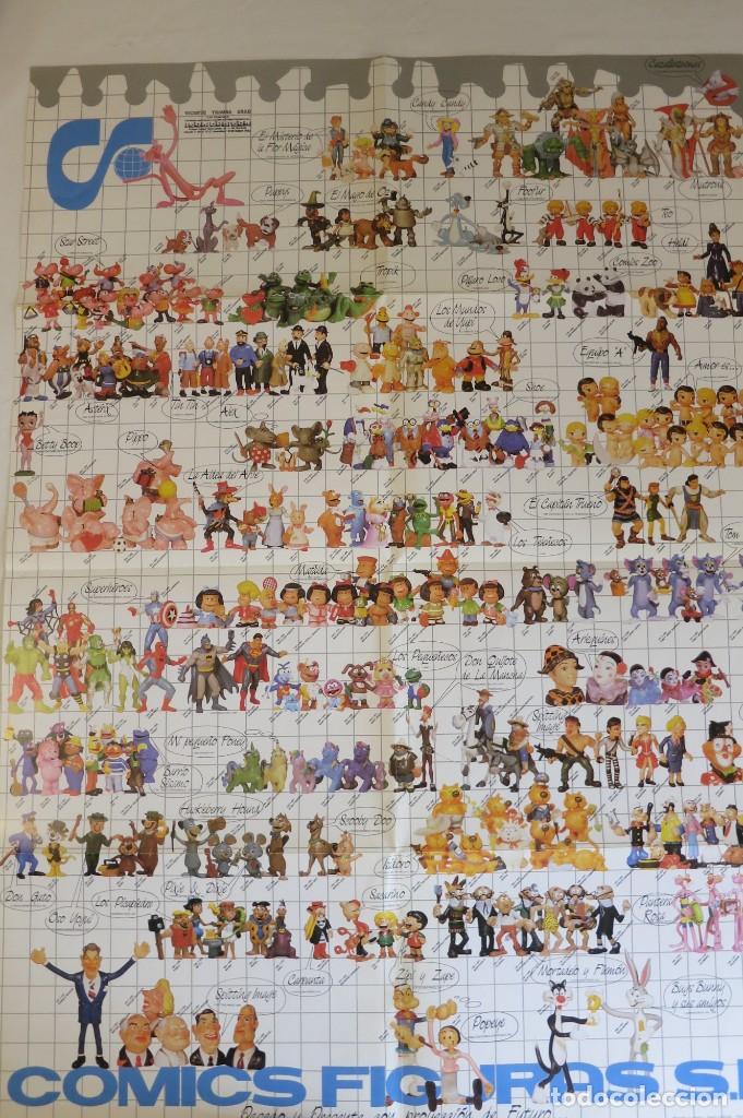 Figuras de goma y PVC: poster publicitario de Comics Spain - Foto 1