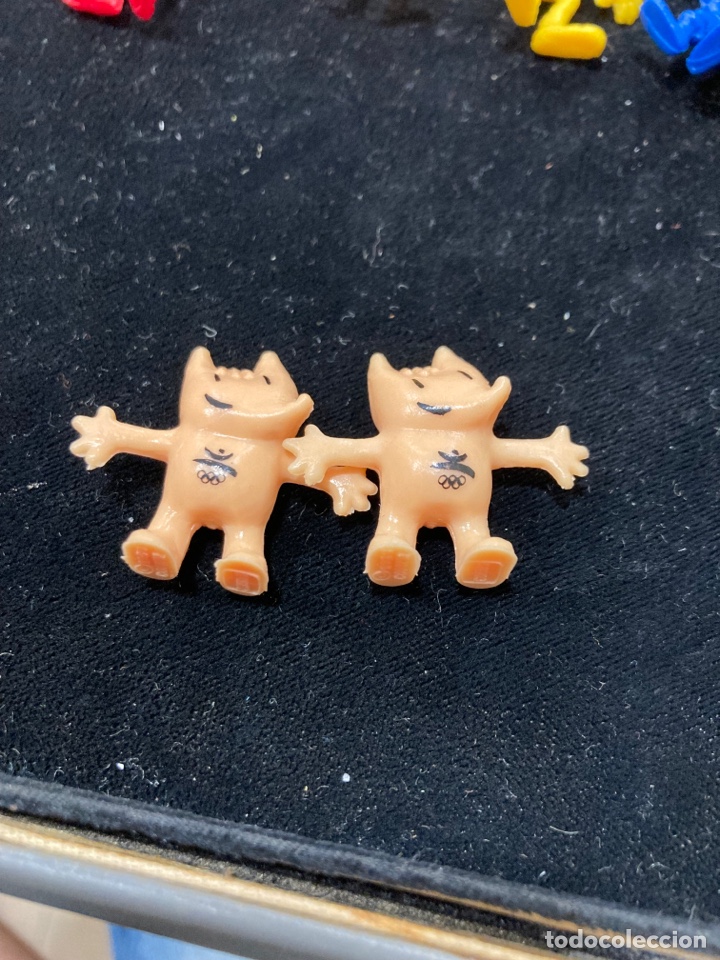 Figuras de goma y PVC: Lote de 2 mu&ntilde;equitos dunkin cobi - Foto 1