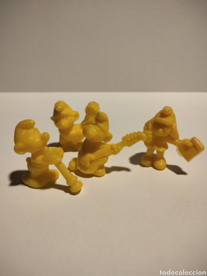 Figuras de goma y PVC: Lote figuras Dunkin Pitufos Amarillo - Foto 1
