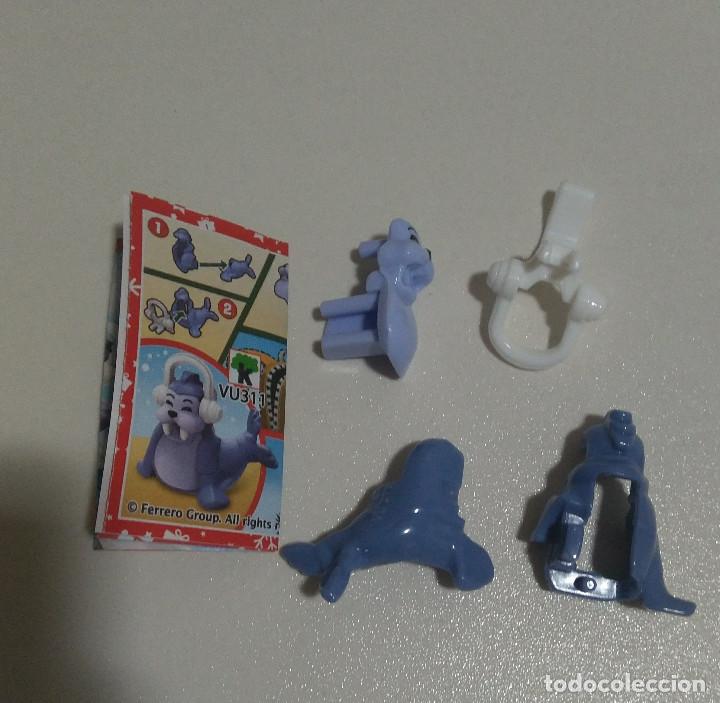 Kinder &Uuml;berraschung: kinder vu 311 foca cascos auriculares bpz papel navidad 2021 completo mu&ntilde;eco navide&ntilde;o figurita