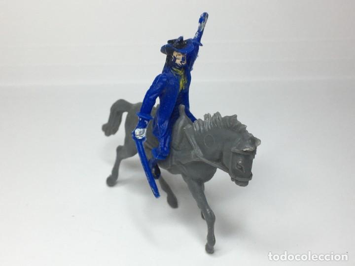 Figuras de goma y PVC: SOLDADO A CABALLO MINI OESTE DE COMANSI 5 CM. - Foto 1