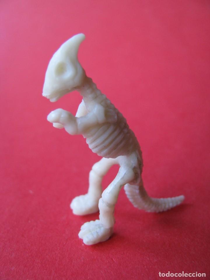 Figuras de goma y PVC: FIGURA DE PLASTICO. ESQUELETO DINOSAURIO, PHOSKITOS. 4 CM.