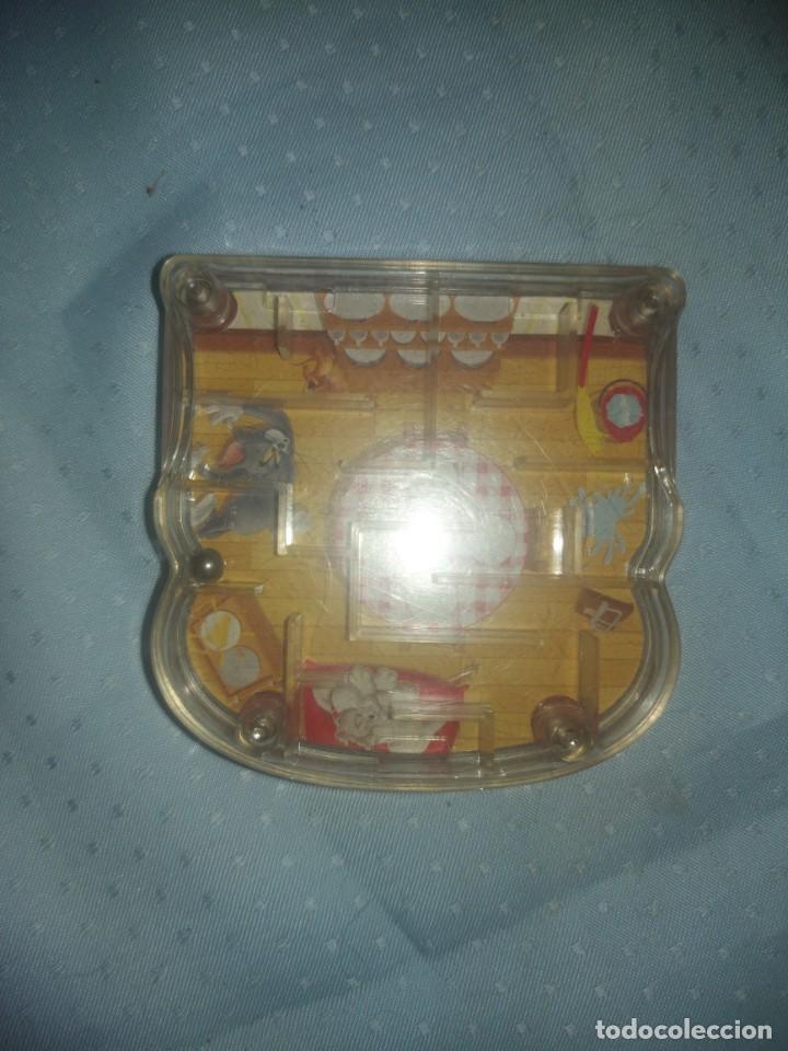 Figuras de Goma y PVC: juguete- laberinto y para marcar sandwiches con la cara de tom y jerry