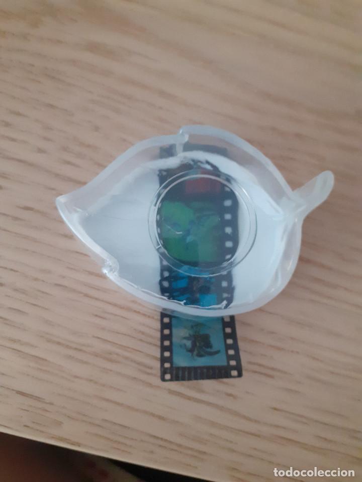 Figuras de Goma y PVC: lupa con fotogramas de la pelicula bichos de disney