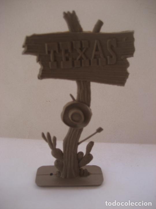 Figuras de goma y PVC: Cartel Texas de Comansi. - Foto 1