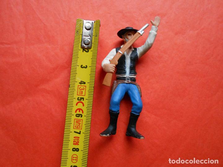 Figuras de goma y PVC: INDIOS Y VAQUEROS DE GOMA - Foto 1