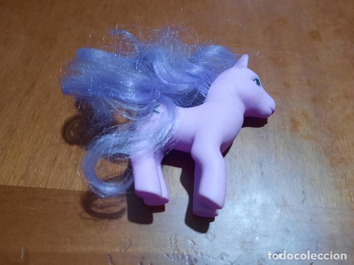 Gummi- und PVC-Figuren: PONI MORADO. BUEN ESTADO. SIN MARCA. 9X10 CM.