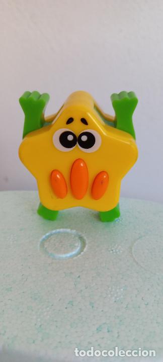 Gummi- und PVC-Figuren: FIGURA, MU&Ntilde;ECO AL APRETAR BOTON EXTIENDE LOS BRAZOS Y PIERNAS. DESCONOZCO.