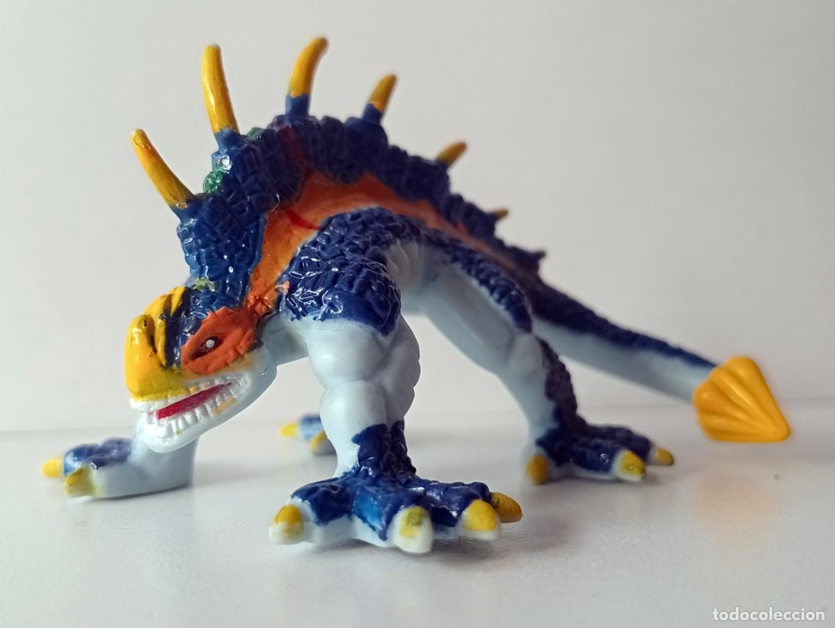 Figuras de goma y PVC: FIGURA INVIZIMALS DRACO - Foto 1
