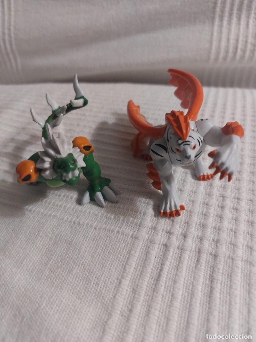 Figuras de goma y PVC: DOS MU&Ntilde;ECOS PVC INVIZIMALS - Foto 1