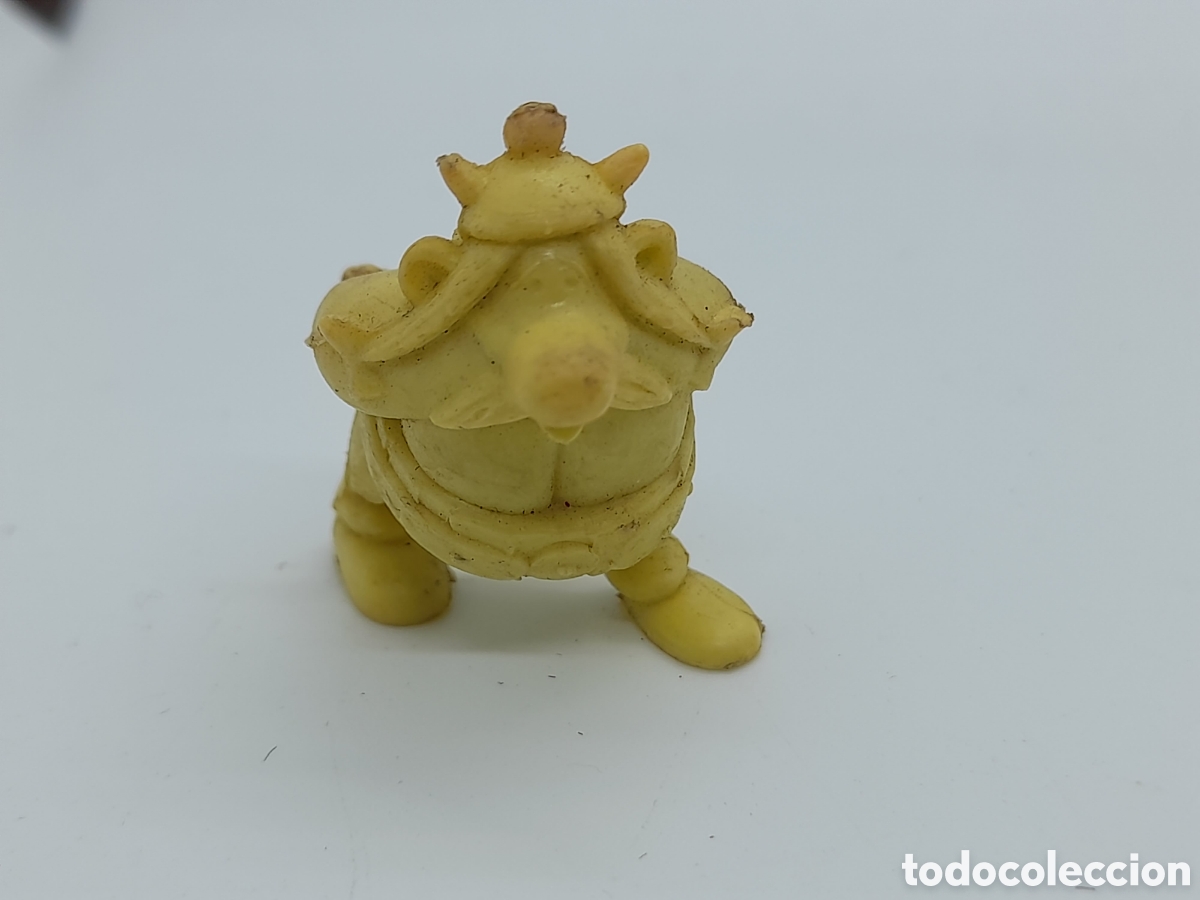 Figuras de goma y PVC: DARGAUD. DUNKIN. TITO. SERIE ASTERIX - Foto 1