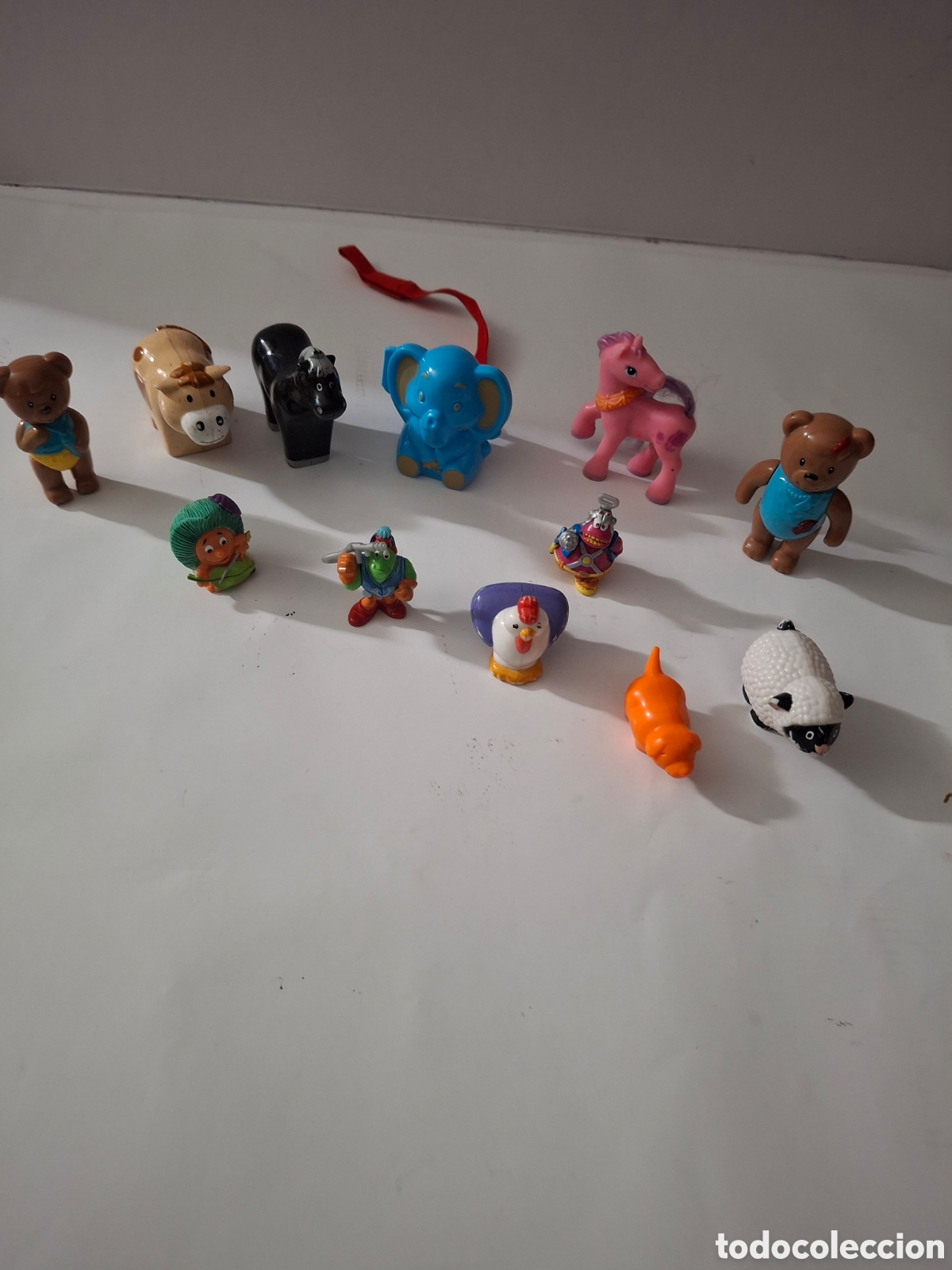 Figuras de goma y PVC: DOCE FIGURAS DIFERENTES - Foto 1