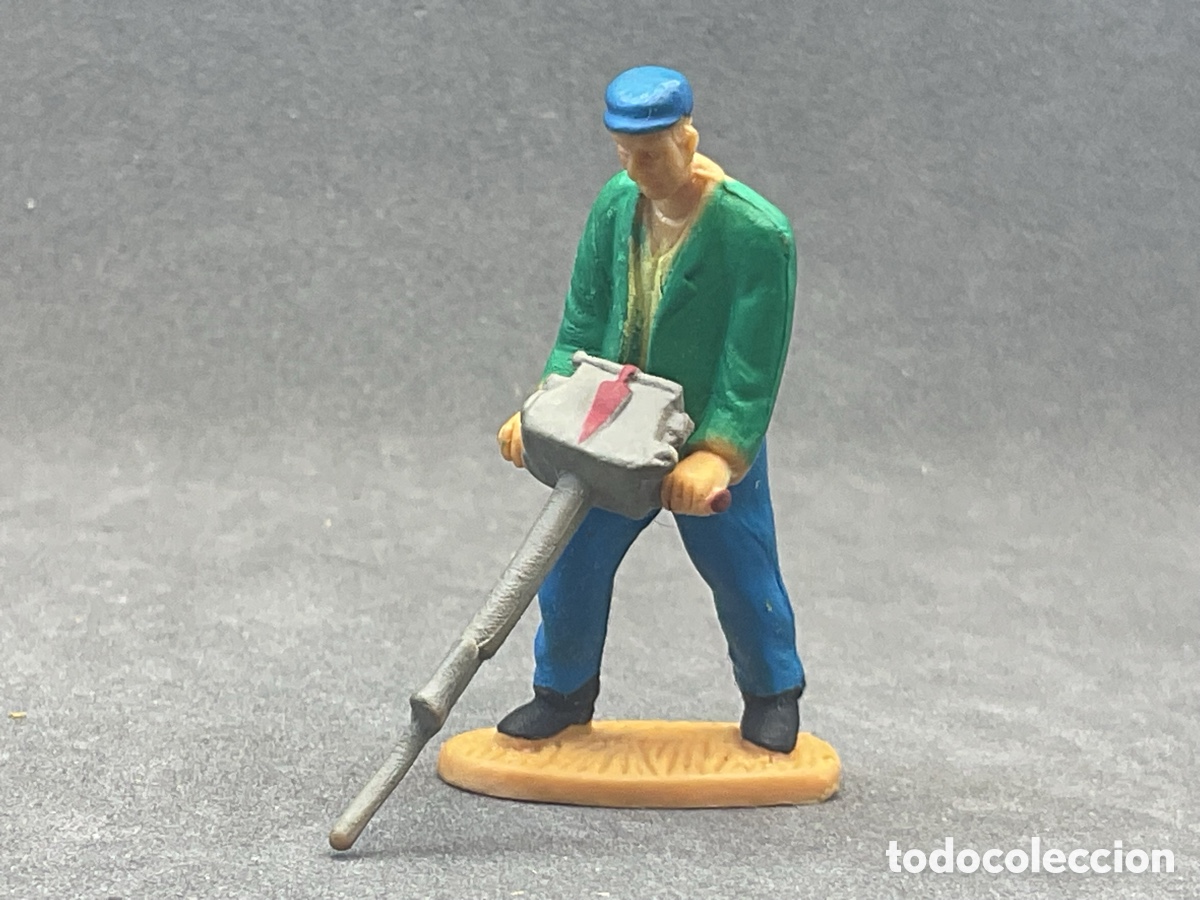 Figuras de Goma y PVC: Peque&ntilde;a Figurita en Goma de Trabajador de la Construcci&oacute;n con Martillo Neum&aacute;tico . 40mm.