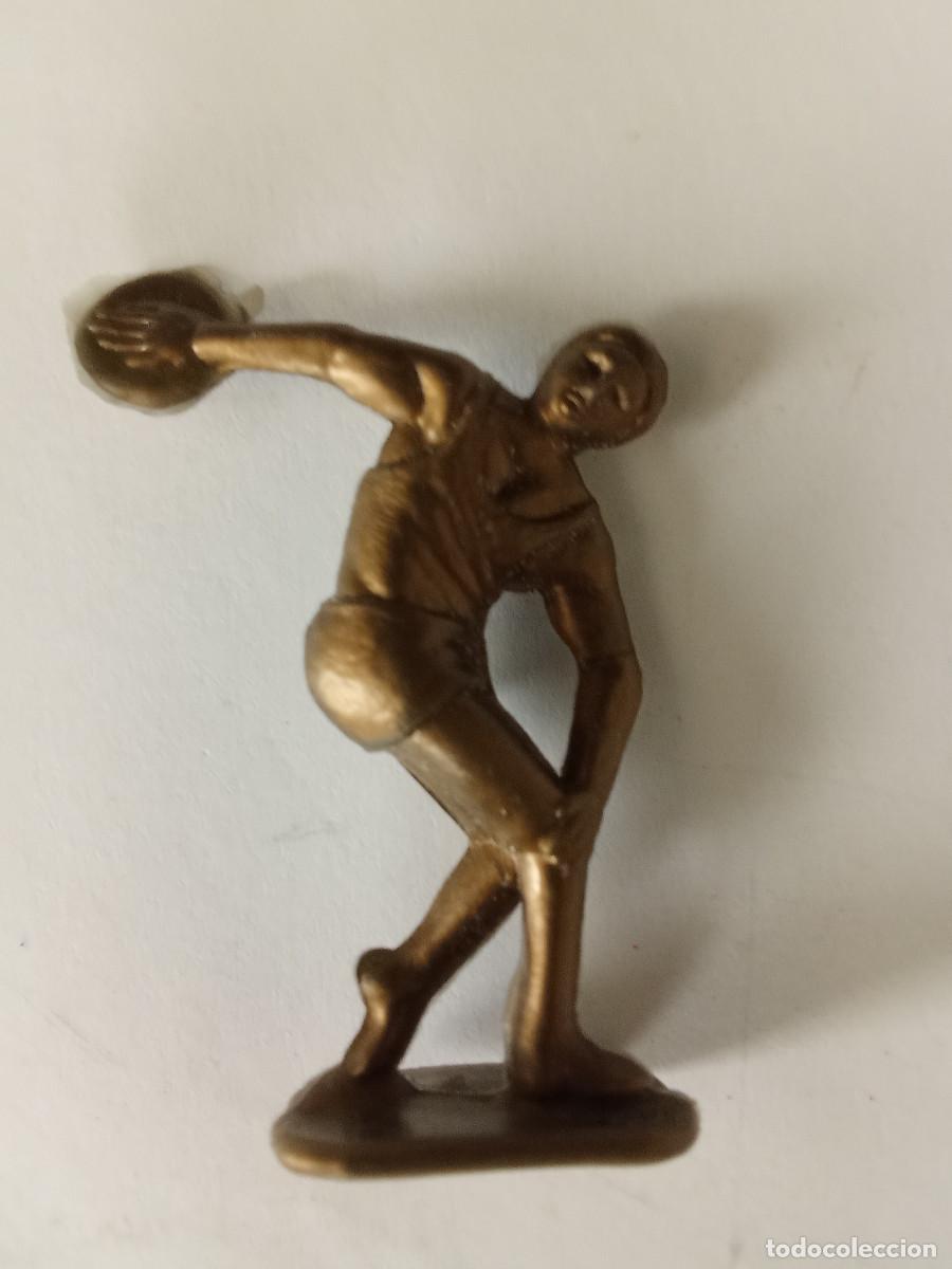 Figuras de Goma y PVC: Figura en pl&aacute;stico lanzamiento de disco Serie Olimpiadas promocional Conguitos.